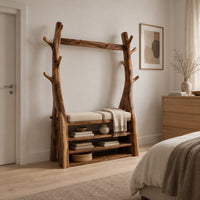 Tree trunk wardrobe with a top beam and bench seat above open shelves in a Scandinavian bedroom with white walls