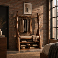 Tree trunk wardrobe with a top beam and bench seat above open shelves in an industrial loft bedroom with exposed brick
