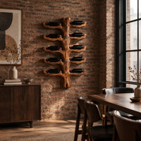 Trunk style wood wine rack with paired branch cradles in tiers in an industrial loft dining room with exposed brick