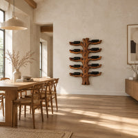 Trunk style wood wine rack with paired branch cradles in tiers in a bright open plan dining room