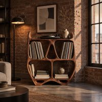 Turntable stand shaped like a sculpted open shelf unit with two pointed tips in an industrial loft living room with exposed brick
