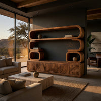 TV cabinet with stacked loop shelves above in a living room at golden hour