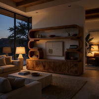 TV cabinet with stacked loop shelves above in an evening room lit by two lamps