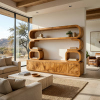 TV cabinet with stacked loop shelves above in a sunlit room with large windows and plants