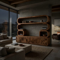 TV cabinet with stacked loop shelves above in a concrete and timber loft