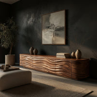 Low TV stand with wave carved door fronts, three-quarter view showing the grain