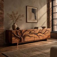 Tv stand with a carved branching tree across four front panels on tapered feet in an industrial loft living room with exposed brick