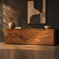 Low wooden tv stand with carved ocean wave and sun ray doors, three-quarter view showing the grain