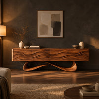 Tv stand with four wave carved panels on a looping pedestal base in a dark living room at golden hour