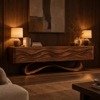 Tv stand with four wave carved panels on a looping pedestal base in an evening living room with walnut wall paneling