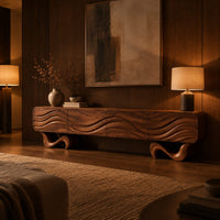 Tv stand with four wave carved panels on two twisting ribbon feet in an evening living room with walnut wall paneling