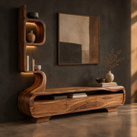 Low media console with a tall sculpted display tower at one end, three-quarter view showing the grain