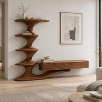 Tv stand with a tiered sculpted tower and a long low cabinet in a Scandinavian living room with white walls