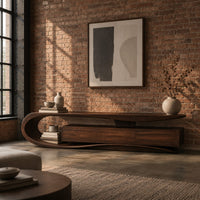Tv stand with a sweeping loop end and low three panel cabinet in an industrial loft living room with exposed brick