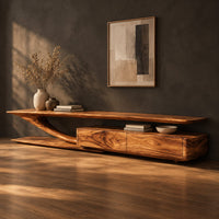 Tv stand with a sweeping plank top and a low two panel cabinet block, three-quarter view showing the grain
