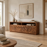 Tv stand with four swirl carved door fronts and two open top bays in a Scandinavian living room with white walls
