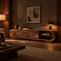 Tv stand with three wave carved fronts and an open looped end shelf in an evening living room with walnut wall paneling