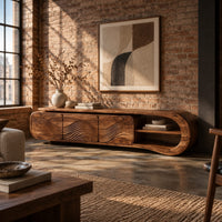 Tv stand with three wave carved fronts and an open looped end shelf in an industrial loft living room with exposed brick
