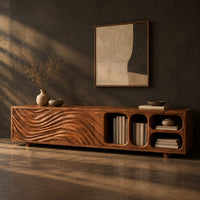 Low tv stand with wave carved fronts and open pill shaped cubbies, three-quarter view showing the grain