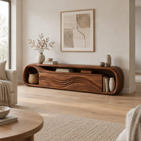 Capsule shaped tv stand with wave relief fronts and an open end niche in a Scandinavian living room with white walls