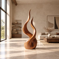 Twin flame wood sculpture with two tall tips and a smooth teardrop base in a bright open plan living room