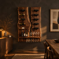 Twin live edge slab wine rack with angled pegs and a bottom shelf in a dark dining room at golden hour