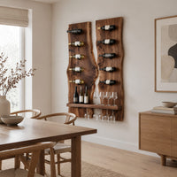 Twin live edge slab wine rack with angled pegs and a bottom shelf in a Scandinavian dining room with white walls