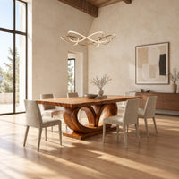Rectangular dining table on a base of two large open loops in a bright open plan dining room