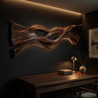 Twin strand wooden wall art with an eye shaped opening above a desk in a dark study corner
