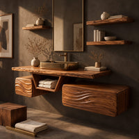 Corner detail of floating wood vanity with a center niche and two wave carved boxes beside wood, brass and linen samples