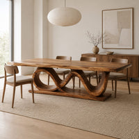 Dining table with a slab top on a twin wave ribbon base in a Scandinavian dining room with white walls