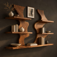 Corner detail of pair of wavy wood wall shelves with three open shelf levels beside wood, brass and linen samples