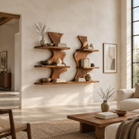 Pair of wavy wood wall shelves with three open shelf levels in a bright open plan living room