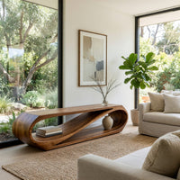 Twist loop TV console with a diagonal inner sweep in an open plan space in daylight