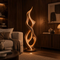 Tall twisted flame floor lamp on a low disc base in an evening living room with walnut wall paneling
