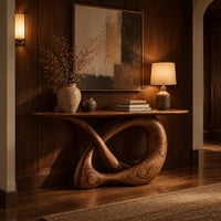 Console table with a twisted knot loop base and an oval top in an evening entryway with walnut wall paneling