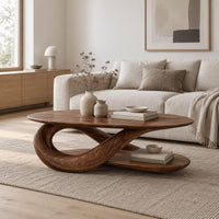 Oval coffee table on a twisted ribbon base with a flat oval shelf below in a Scandinavian living room with white walls