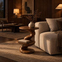 Side table with a spiral twisted stem and two round tiers in an evening living room with walnut wall paneling