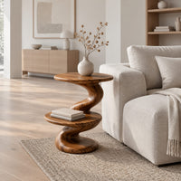 Side table with a spiral twisted stem and two round tiers in a Scandinavian living room with white walls