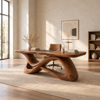 Desk with a smooth top on a twisting ribbon base with an open loop in a bright open plan home office