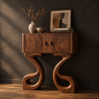 Two door console cabinet on large looping ribbon shaped legs, three-quarter view showing the grain