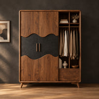Wardrobe with two doors, a dark wavy panel and an open shelf bay in a dark studio against a charcoal plaster wall
