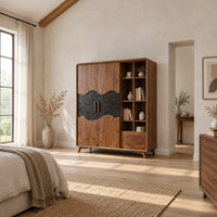 Wardrobe with two doors, a dark wavy panel and an open shelf bay in a bright open plan bedroom