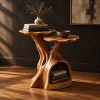 Two tier side table with a trunk base and a hollow for books, three-quarter view showing the grain