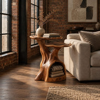 Two tier side table with a trunk base and a hollow for books in an industrial loft living room with exposed brick