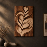 Wall art panel with a carved leaf relief in light and dark tones on a dark charcoal plaster wall