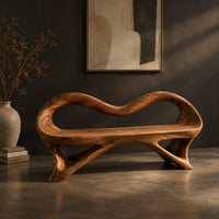 Wooden bench with a wavy looped rim and slender splayed legs, three-quarter view showing the grain
