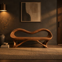 Wooden bench with a wavy looped rim and slender splayed legs in a dark entryway at golden hour