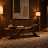 Bench with a flat plank seat, a swooping base and an upswept tail in an evening entryway with walnut wall paneling