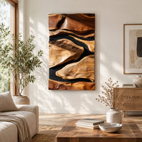 Vertical carved wall art with flowing forms on a dark ground in a bright sunroom with green plants